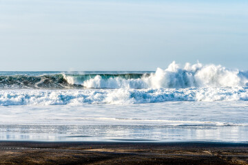 waves crashing on the beach
