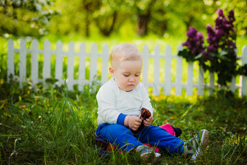 boy sitting on the grass