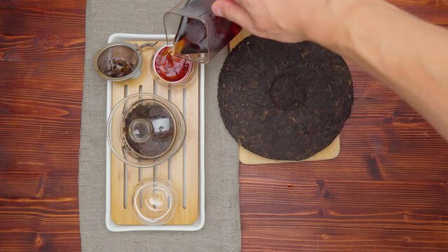 Shu Pu erh cake in English chinese fermented black tea. Healthy invigorating drink coffee substitute. Top view