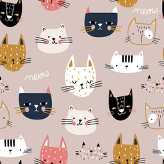Seamless childish pattern with cute hand drawn cat faces. Creative kids hand drawn texture for fabric, wrapping, textile, wallpaper, apparel. Vector illustration