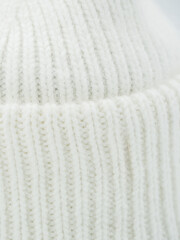 Fashionable, stylish winter hat, white