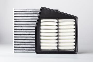 New car air filters and cabin filter. Protection against dirt and dust. Auto parts concept, clean air