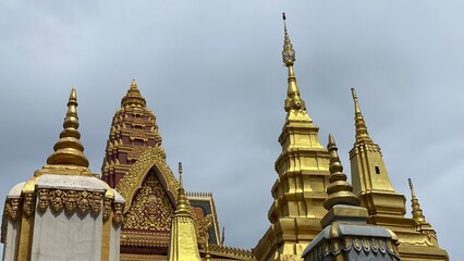 Fototapeta premium Ornate Buddhist golden towers and stupas, Cambodia