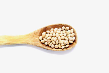 Carioca beans spoon on the white background. Brazilian beans.