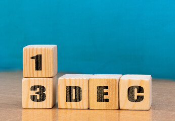Cube shape calendar for December 13 on wooden surface with empty space for text,cube calendar for...