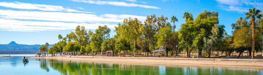 Tranquil lakefront walking trail landscape at Lake Havasu and turquoise-colored water in Havasu City, Arizona