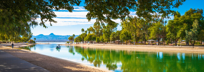 Tranquil lakefront walking trail landscape at Lake Havasu and turquoise-colored water in Havasu City, Arizona