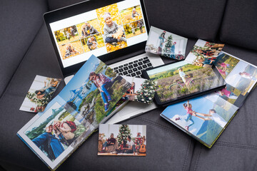 Fototapeta na wymiar Laptop with photo, photoalbum, album