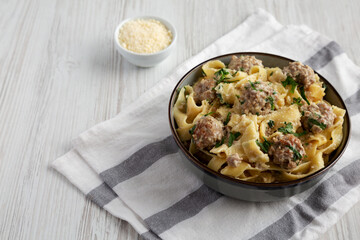 Homemade One-Pot Swedish Meatball Pasta in a Bowl, side view. Space for text.