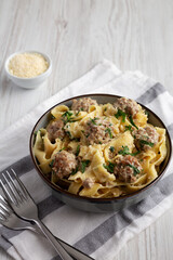 Homemade One-Pot Swedish Meatball Pasta in a Bowl, side view.