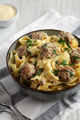 Homemade One-Pot Swedish Meatball Pasta in a Bowl, side view.