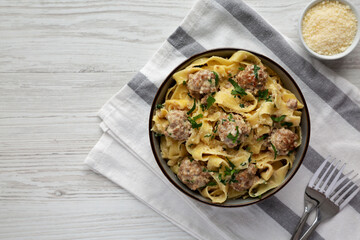 Homemade One-Pot Swedish Meatball Pasta in a Bowl, top view. Flat lay, overhead, from above. Copy space.