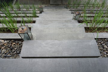 Top view of stair steps and small lanterns in the garden