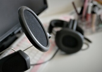 Obraz na płótnie Canvas Home studio podcast interior with headphone