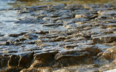 Big rocks in the sea stone background