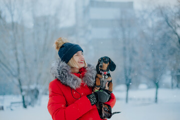 woman playing with snow