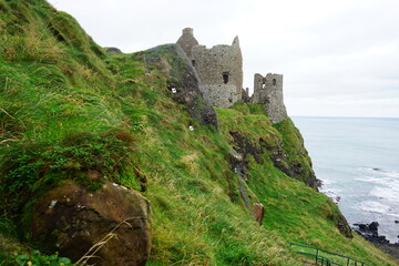 Dunluce Castle, ruined medieval castle, on Antrim Coast in Northern Ireland