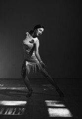 Beautiful woman dancer dancing on the stage