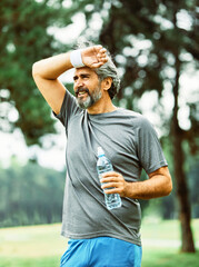 outdoor senior fitness man lifestyle active sport exercise healthy fit retirement jogging running...