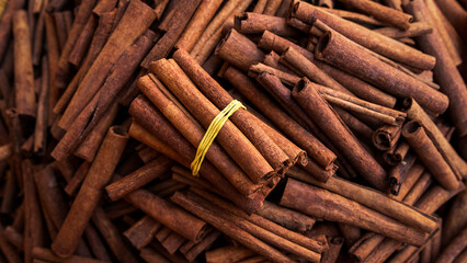 Dry organic cinnamon sticks in a bunch