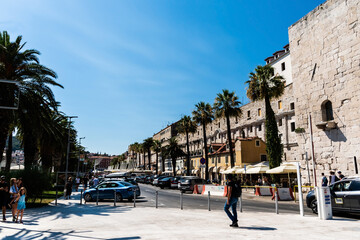 View of the Obala Hrvatskog Narodnog Preporoda street with tourists. Split, Croatia.