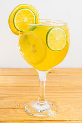 cocktail glass, on wood table