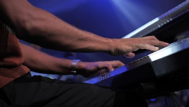 Pianist playing on stage