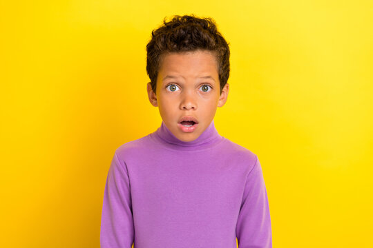 Photo portrait of adorable little boy frustrated unbelievable unexpected news wear trendy violet outfit isolated on yellow color background