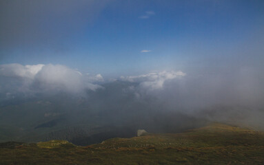 Beautifull over clouds view of Chornohora highest mountain range in Western Ukraine after the storm.