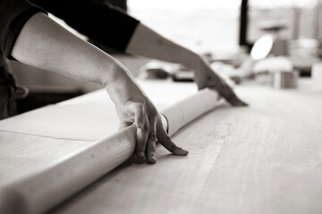 Close up of female hands working with rolling-pin for italian fresh pasta -  Female hands rolling ...