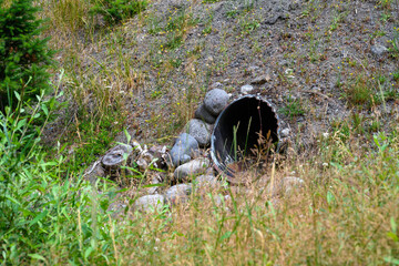 Old, corroded stormwater drainage pipe, Mt. Rainier National Park, WA
