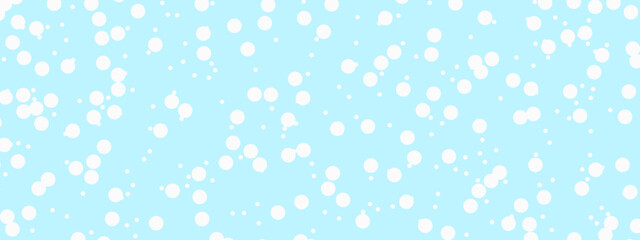Fototapeta na wymiar White snow falling on blue sky background. Winter snow falling background with copy space. 