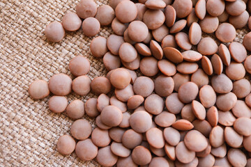 Brown lentils on fabric 