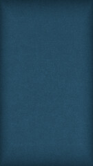 Dark blue colored paper texture. Tinted vertical background. Textured mobile phone wallpaper with vignetting. Large patterned surface. Fibers and irregularities are visible. Top-down