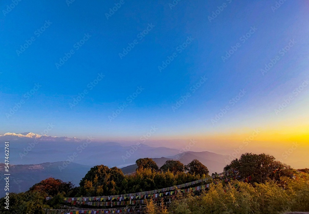 Poster Beautiful sunset over Tiger Hill in India.