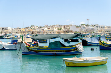 Fototapeta na wymiar Fishing boats in Marsaxlokk, Malta