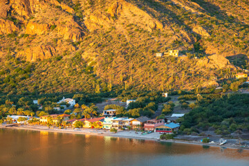 A beach community seen from above at sunrise on the  Bah&iacute;a Concepci&oacute;n, Sea of Cortez, Baja de California Sur, Mexico