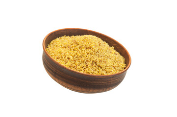 bulgur in a clay bowl on a white background. the concept of a good harvest of bulgur