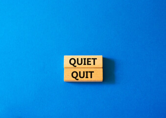 Quiet quit symbol. Concept word Quiet quit on wooden blocks. Beautiful blue background. Business and Quiet quit concept. Copy space