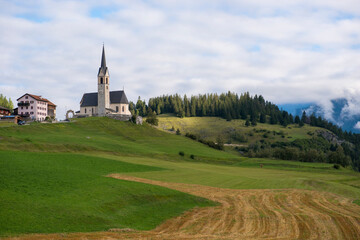 View on a church and houses in Reams, Graubünden, Switzerland