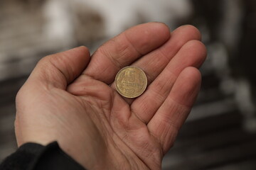 Old Bulgarian coin in hand