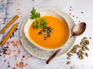 Pumpkin traditional soup with creamy  texture . Top view 
