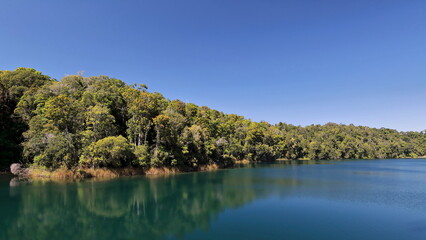 Fototapeta na wymiar View to the south over Lake Eacham-Yidyam-Wiinggina from the day-use area. Queensland-Australia-283