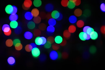 Artistic style - bokeh of lights in the background with blurring lights for your design, vintage or retro color tone