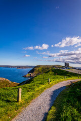 Fototapeta na wymiar Trail at Signal Hill Saint John Newfoundland Canada with blue ocean as background