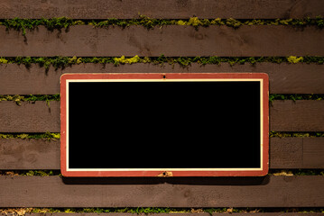 Empty chalk board background. Blank blackboard with wooden frame. Wooden slates background