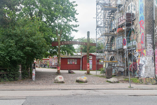 Copenhagen, Denmark - July 26, 2022: Most known entrance to Freetown Christiania. Freetown Christiania with Pusher Street is famous for its open trade of cannabis, which is illegal in Denmark.