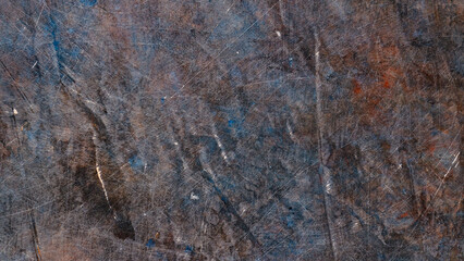 Dark abstract background of scratched surface. Faded paint texture. Grunge surface vintage backdrop