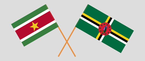 Crossed flags of Suriname and Dominica. Official colors. Correct proportion