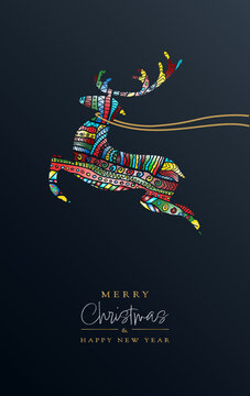 Christmas greeting card - original colourful reindeer ornament on dark background - Merry Christmas and happy new year